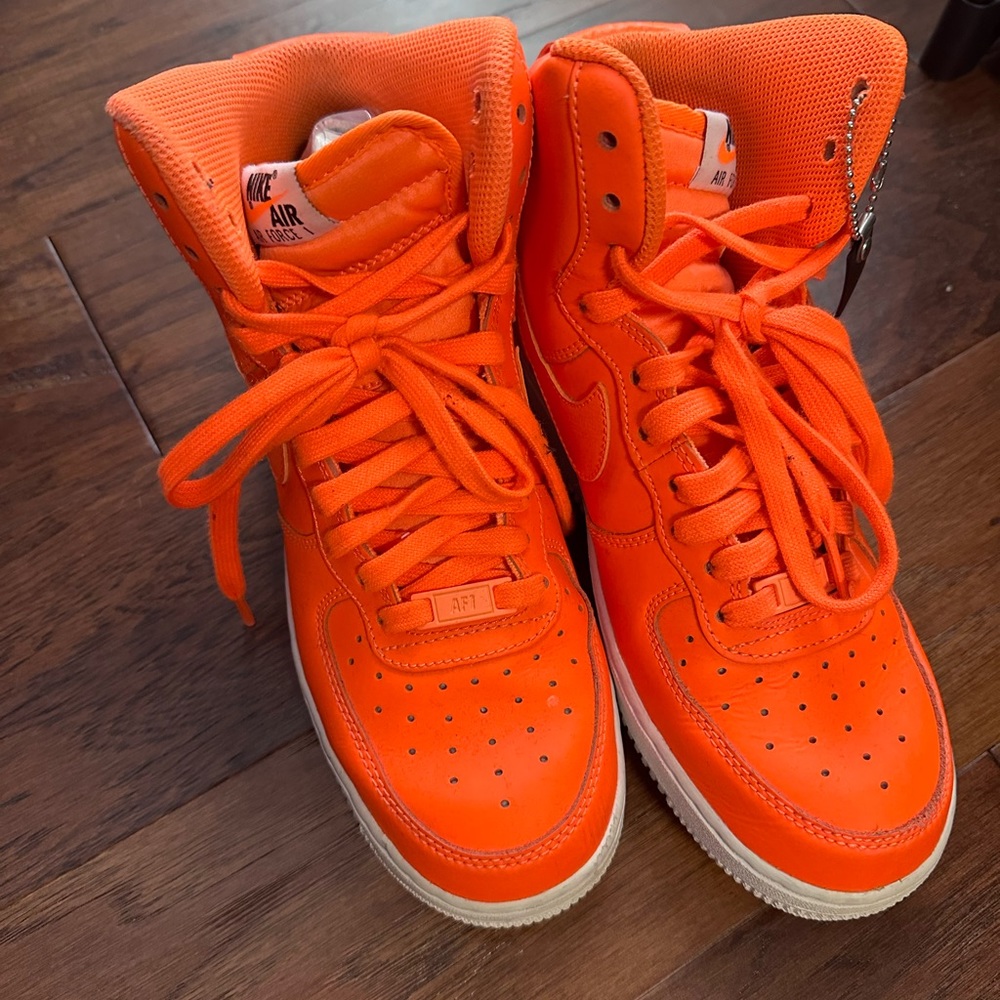 Neon orange Nikes